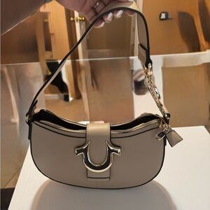 True Religion Cream and Black Crescent Shoulder Bag with Gold Hardware